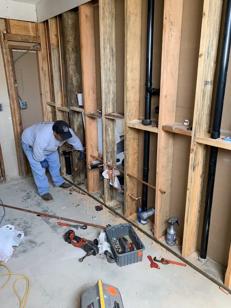 Commercial rough-in plumbing for Water Heater Replacement in Vermont Square